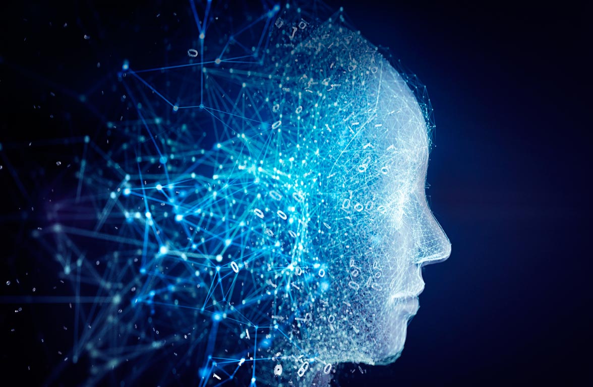 Ein abstraktes Profil eines menschlichen Kopfes, das aus leuchtenden, blauen Netzwerken und Punkten besteht. Die Darstellung symbolisiert digitale Intelligenz und Fortschritt, mit einem dunklen Hintergrund, der die blauen Elemente hervorhebt.
